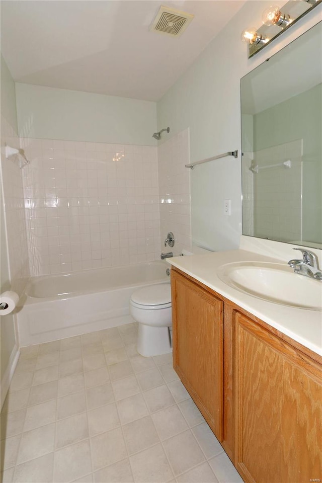 bathroom with vanity,  shower combination, toilet, and visible vents