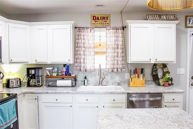 kitchen with sink, white cabinetry, and dishwasher