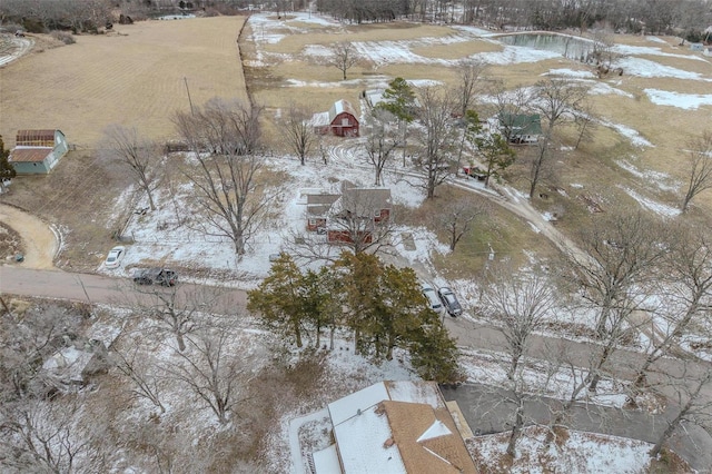 snowy aerial view with a rural view