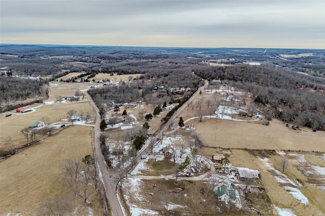 birds eye view of property featuring a rural view