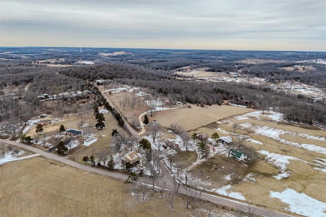 snowy aerial view with a rural view