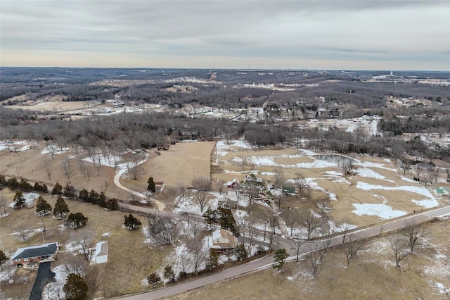 snowy aerial view with a rural view