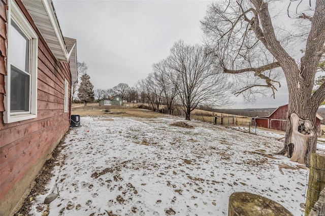 view of yard covered in snow