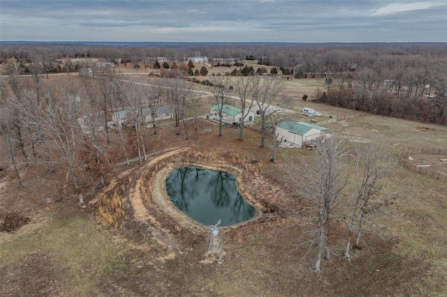 aerial view with a rural view and a water view