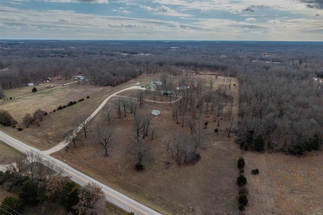 birds eye view of property featuring a rural view