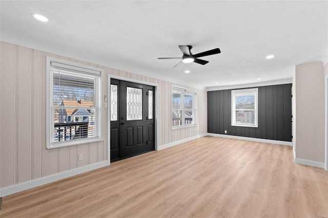 entrance foyer featuring light hardwood / wood-style floors and ceiling fan