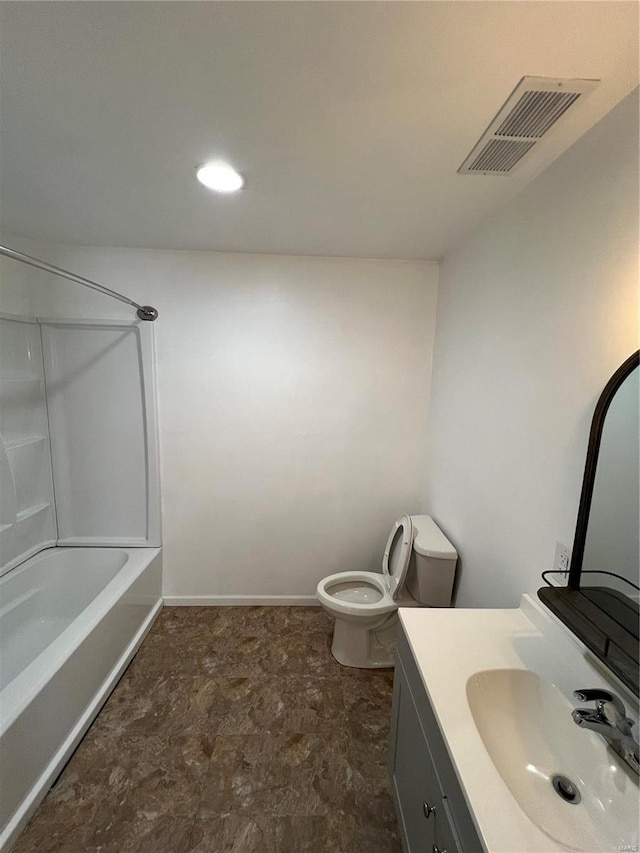 full bathroom featuring vanity, tub / shower combination, and toilet