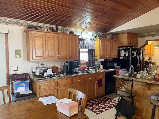 kitchen with sink, wood ceiling, light tile patterned floors, black appliances, and vaulted ceiling