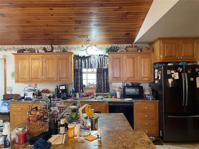 kitchen with sink, wood ceiling, light tile patterned floors, dark stone counters, and black appliances