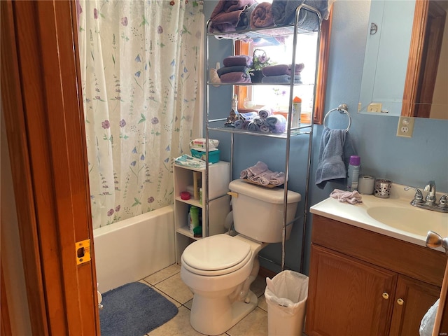 full bathroom featuring shower / tub combo with curtain, vanity, toilet, and tile patterned flooring