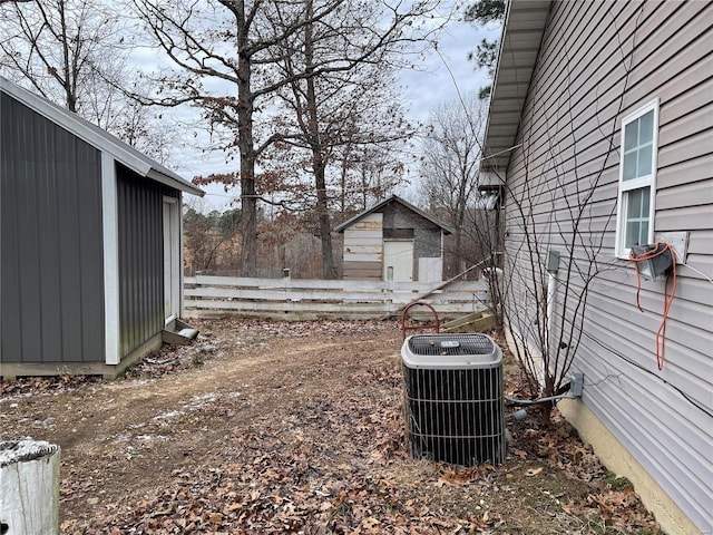 view of yard with central AC unit