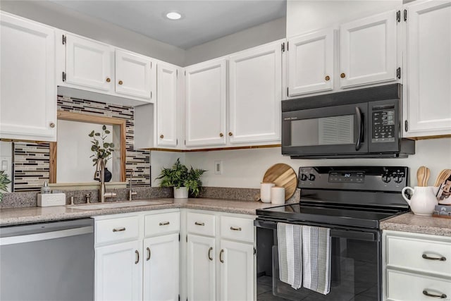 kitchen featuring light countertops, white cabinetry, backsplash, and black appliances