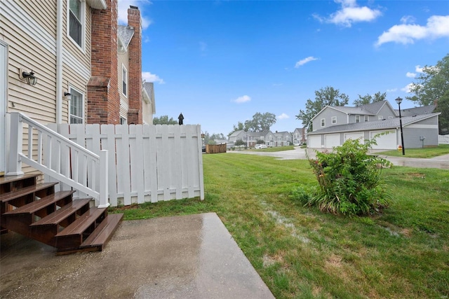 view of yard with a residential view