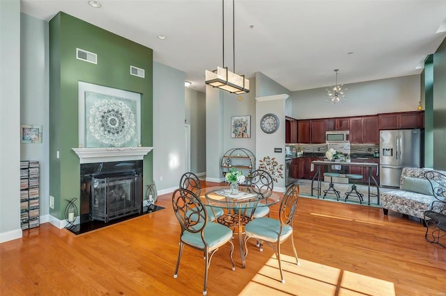 dining room with light wood-type flooring