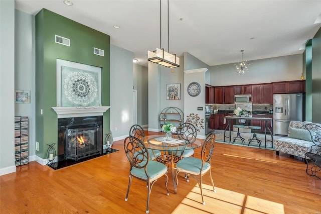 dining area with light wood-type flooring