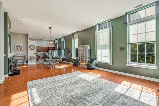 unfurnished living room with hardwood / wood-style flooring