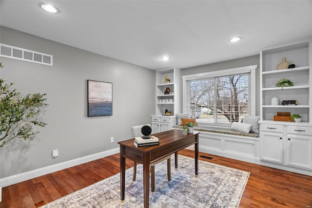 office featuring dark wood finished floors, recessed lighting, baseboards, and visible vents