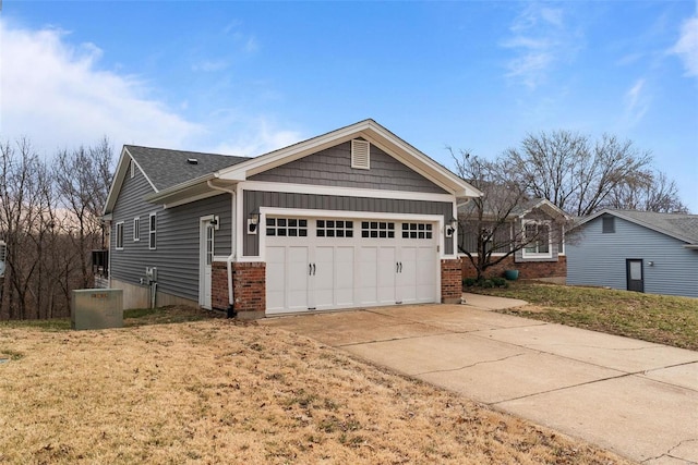 view of property exterior with brick siding, concrete driveway, and an attached garage