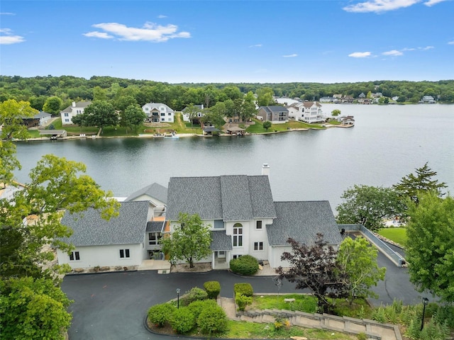 bird's eye view with a water view