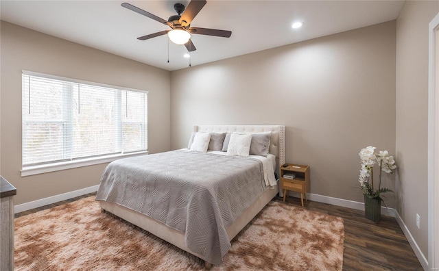 bedroom featuring ceiling fan, baseboards, dark wood finished floors, and recessed lighting