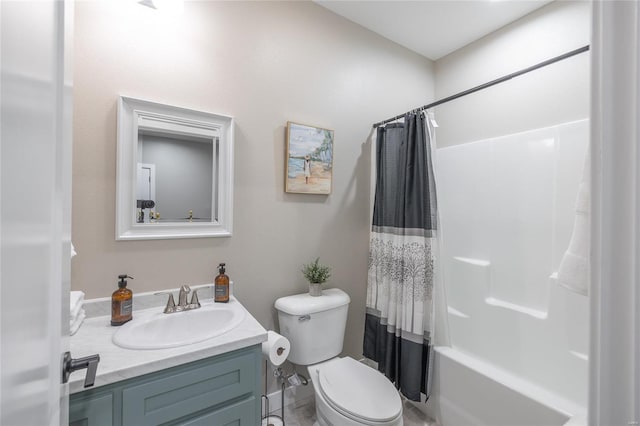 bathroom featuring vanity, toilet, and shower / bath combo with shower curtain