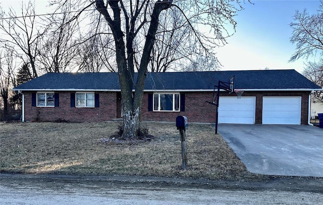 single story home featuring a garage