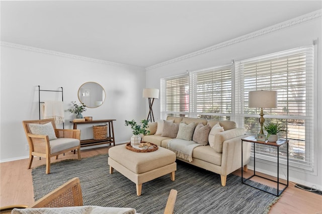 living room featuring dark wood-type flooring and ornamental molding