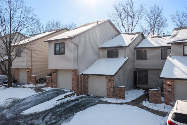 view of front of house with brick siding