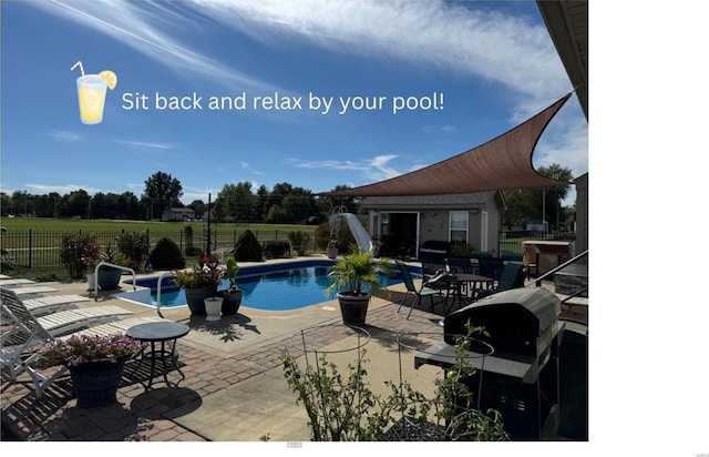 view of swimming pool featuring a fenced in pool, a grill, a patio, and fence