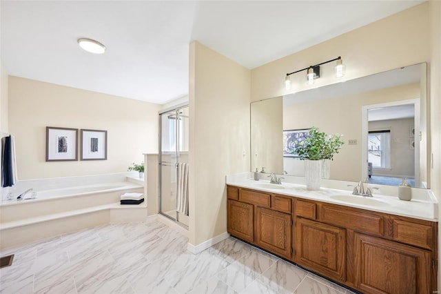 full bath featuring a shower stall, a bath, double vanity, and a sink