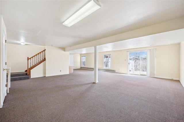 basement featuring stairs, baseboards, and carpet floors