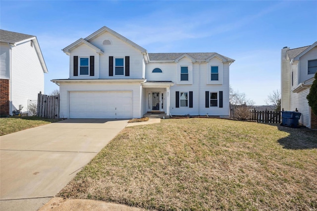 traditional home with concrete driveway, an attached garage, fence, and a front yard