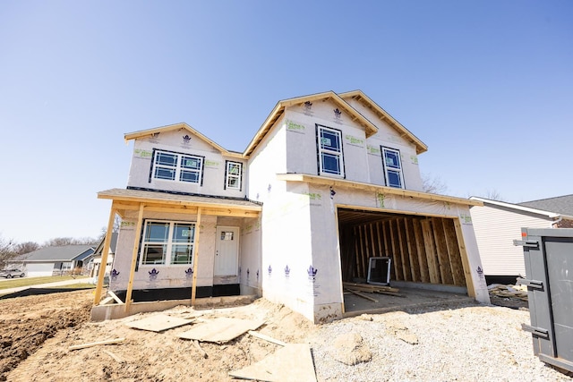 unfinished property with a garage