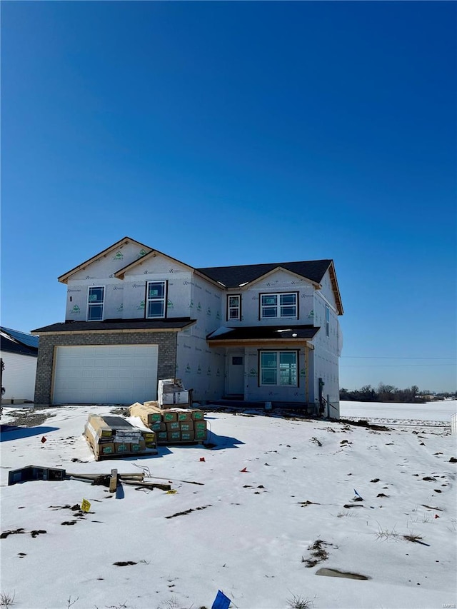 unfinished property with an attached garage