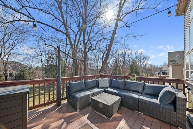 deck with an outdoor hangout area