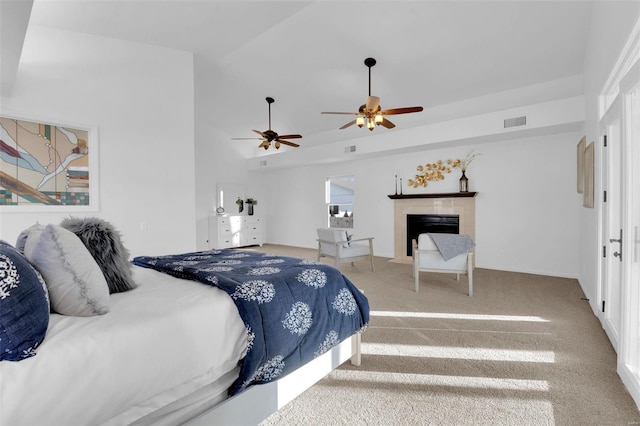 bedroom with lofted ceiling, carpet floors, and ceiling fan