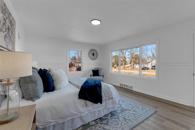 bedroom featuring wood-type flooring