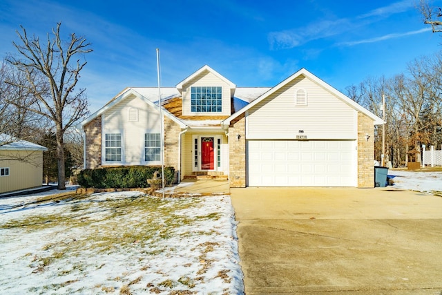 view of front of property with a garage