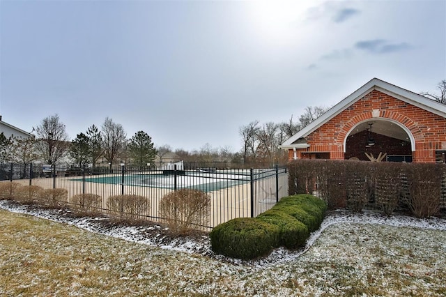 community pool featuring fence