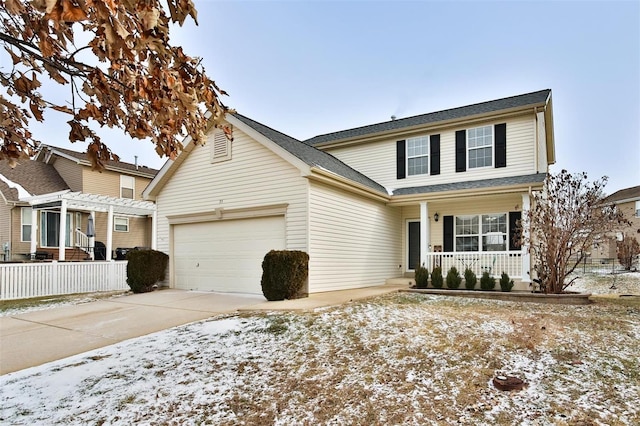 traditional-style house with an attached garage, covered porch, fence, concrete driveway, and a pergola