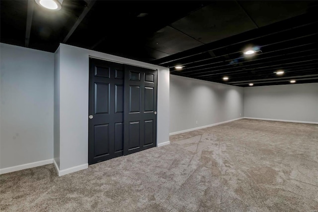 basement with carpet flooring