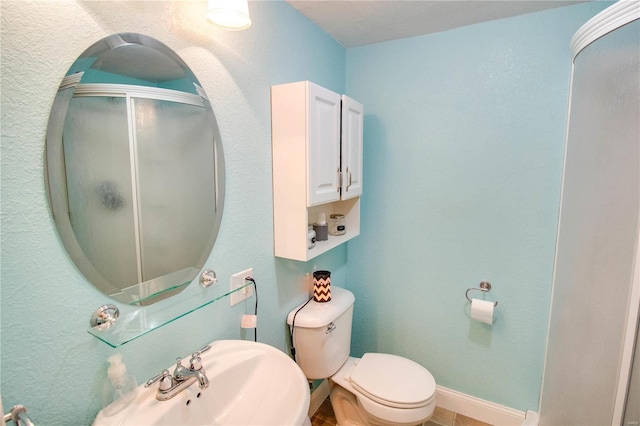 bathroom with sink and toilet