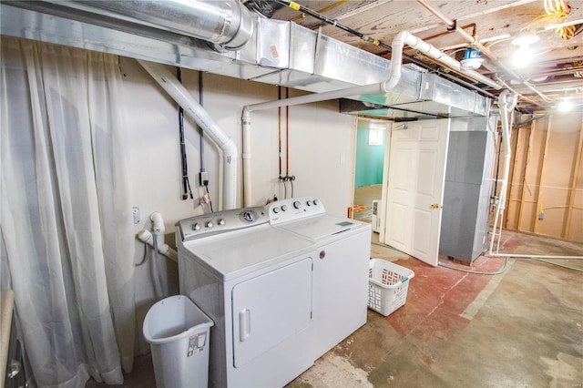 laundry room featuring washing machine and dryer