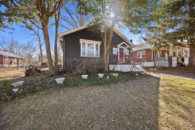 bungalow-style home featuring covered porch