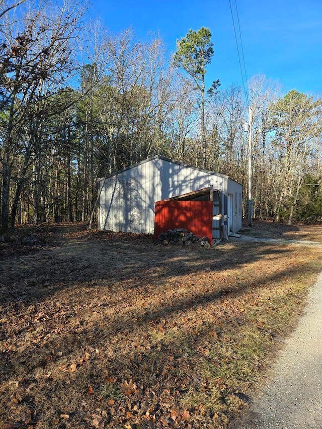 view of outbuilding with a garage