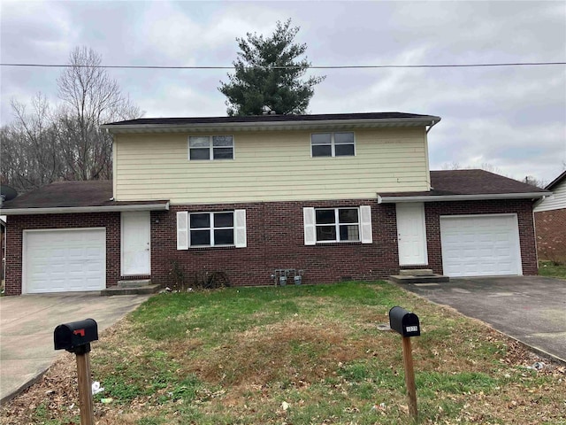 front facade with a front lawn and a garage