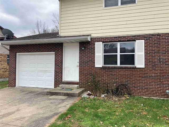 property entrance with a garage