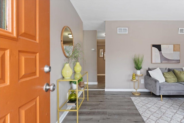 foyer entrance with hardwood / wood-style flooring