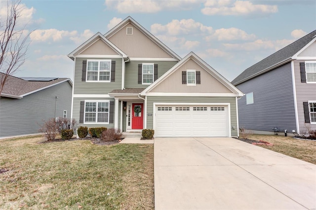 view of front of house featuring concrete driveway, a front lawn, and an attached garage