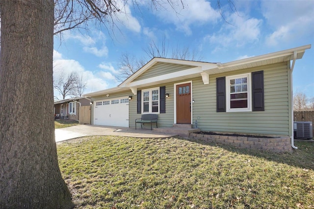 ranch-style home with central air condition unit, an attached garage, concrete driveway, and a front yard